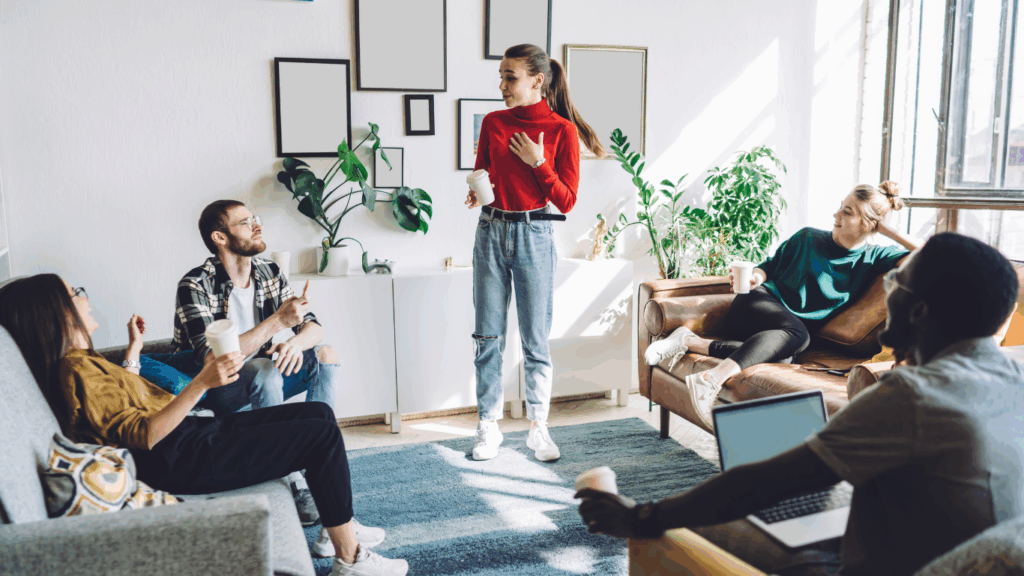 Talking to a group of people, telling a story.